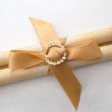 Blank aged scroll with gold accents and brooch, handmade in the USA